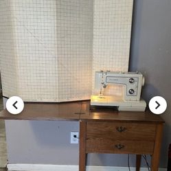 Kenmore Sewing Machine and cabinet