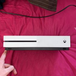 White Xbox one S + power Cord + a selection of games 
