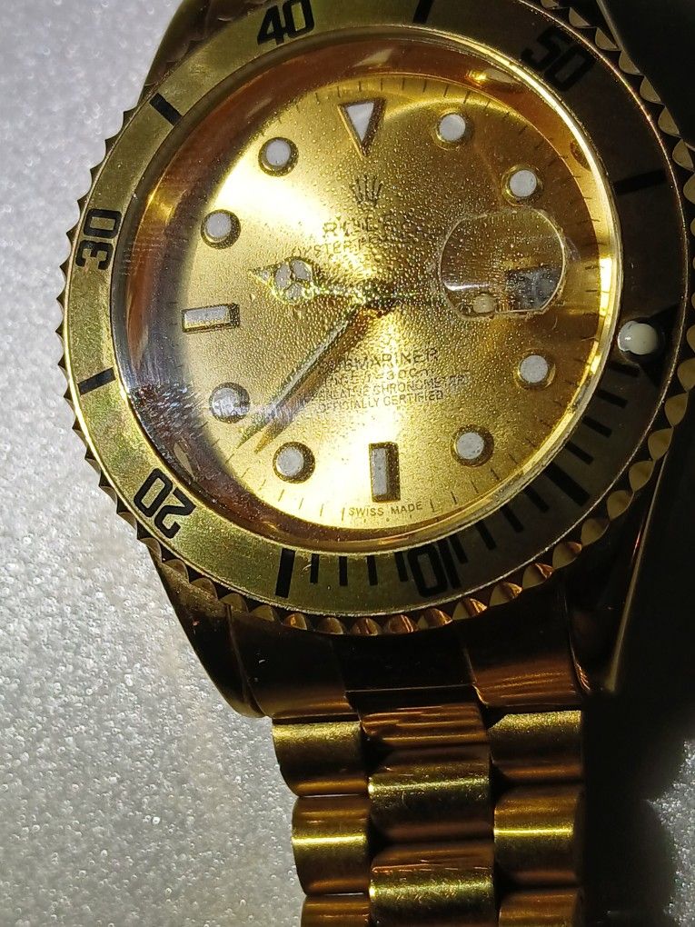 New High Gold Watch