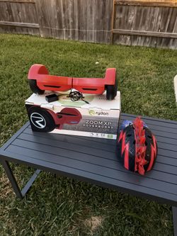 Rydon Zoom XP electric hoverboard and a safety helmet.