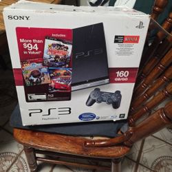 PlayStation 3 with controller power cord and one game