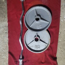 OLYMPIC  2" HOLE.   EZ-CURL BAR WITH   2-35s .  TOTAL 70LBs
11525 S HALSTED DUNKIN DONUTS/
7111  S. WESTERN WALGREENS 
100$     CASH ONLY.  AS IS