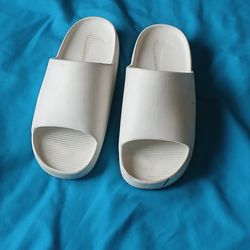 White Nike Calms women's size 8