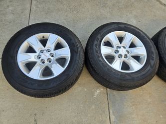 4 GMC STOCK TIRES/RIM