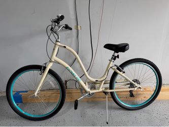Electra Townie 7D Step-Thru cruiser bike in cream.