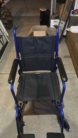 Transport wheelchair