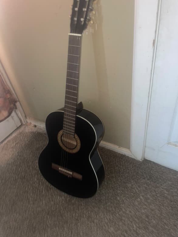 Black 6 String Gutiar
