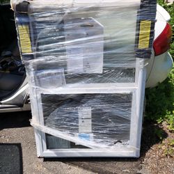 Two brand new pella windows.  $200 each 36x46 new construction