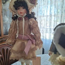 7 Porcelain Dolls Sold As Group