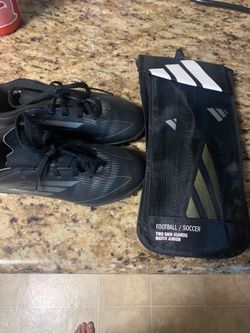 Indoor kids soccer shoes and shin guards