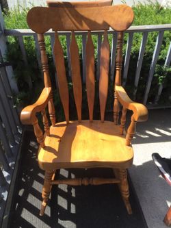 Beautiful wood rocking chair.