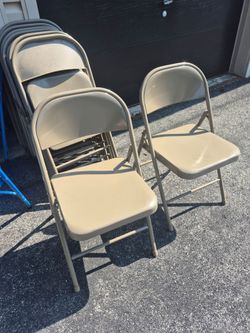 Brown metal folding chairs