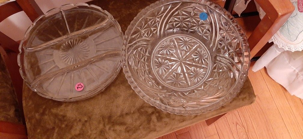 Two glass serving dishes with decorative patterns.