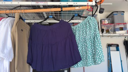 2 Lg tiered mini skirts with liner.