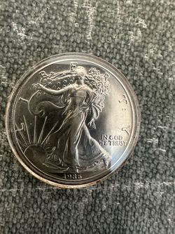 1986 American Silver Eagle (1 Troy Ounce .999 fine silver)