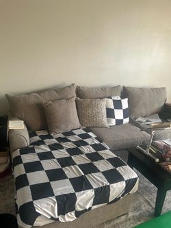 L-Shaped beige sofa