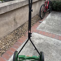 This is a Scotts 16 in. Manual Walk Behind Push Reel Lawn Mower (Model 415-16S).  