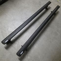 Thule Rapid Podium 300R rack with 61” Thule AeroBlade/WingBar crossbars