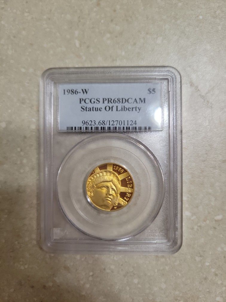 1986 W Statue Of Liberty $5 Proof Gold Coin.  Graded 