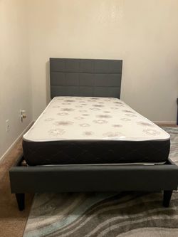 Twin size bed frame with mattress