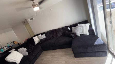 Oversized black sectional couch