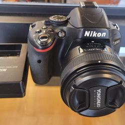 Nikon D5100 Camera + 50mm Lens 