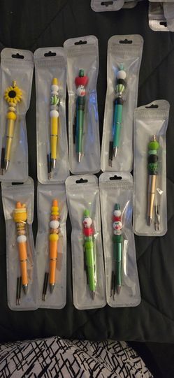 handmade retractable badgeholder, pens and keychains