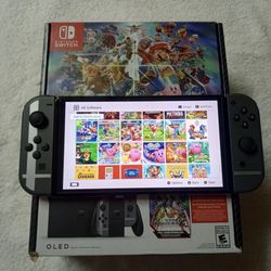 NINTENDO SWITCH OLED + 125 SWITCH GAMES