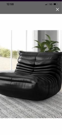 Toga Chair in Black Leather— still in original vacuum seal packaging