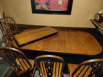 Solid oak table and chairs