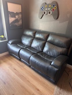 Leather power recline sofa
