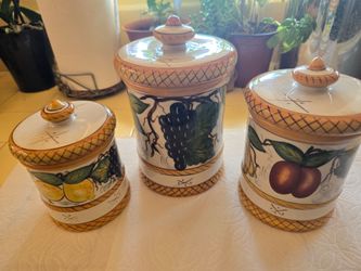 Ceramic canister set and fruit themed decor