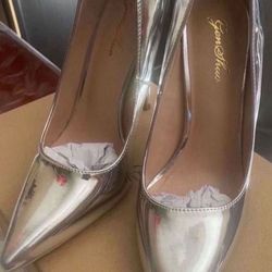 Silver high heels $20 never used size 7.
