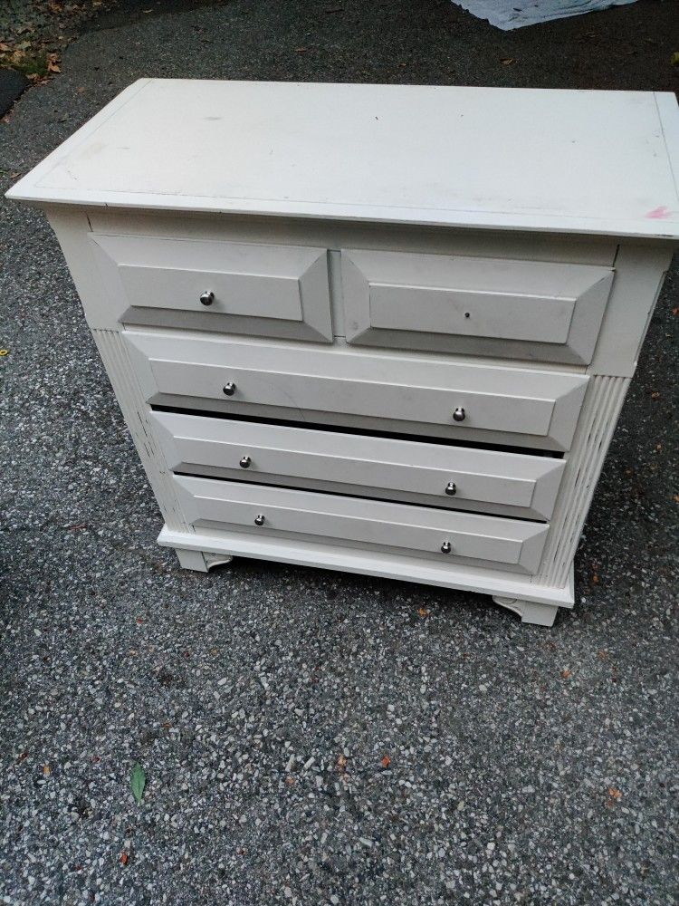 White clothing Dresser.