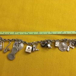 Beautiful vintage 14k gold charm(20pcs) bracelet.