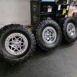 17" KMC rims w- 37" Gladiator XT  Tires 