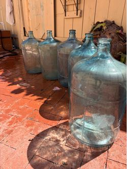 Vintage water jug 5 gal glass