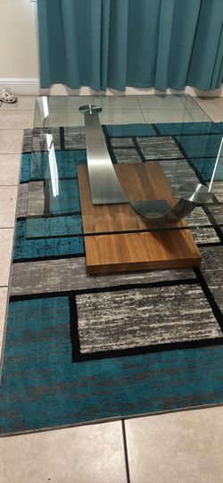 Mesa de centro y carpeta