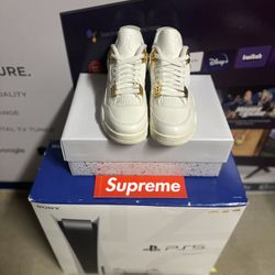 Jordan 4 Metallic Gold