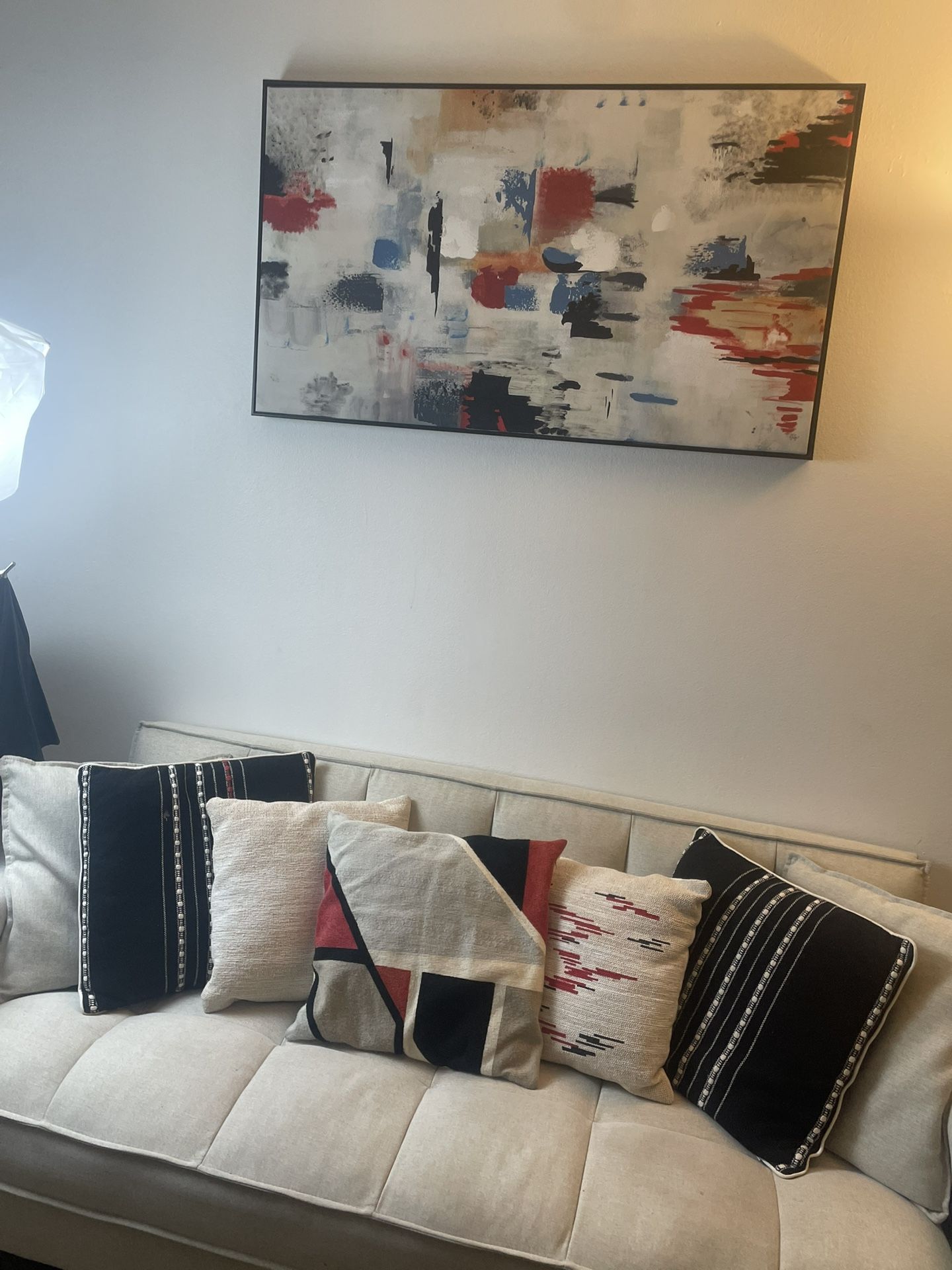 Small Sofa Couch Throw pillows And Wall Painting