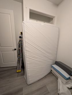 Tuft & Needle queen mattress with 3" topper and mattress cover