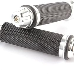 The product is a set of CNC 7/8" gel hand grips handle bars. These black grips are made of aluminum and rubber, featuring a non-slip gel rubber surfac