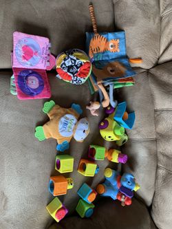Collection Of Baby Toys- Crinkle, Rolling Dumbo, Dump Truck And Blocks, Books