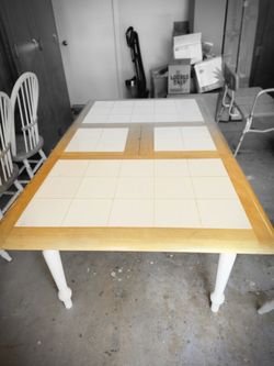 Kitchen wood and Tile table w/built in leaf and 4 chairs