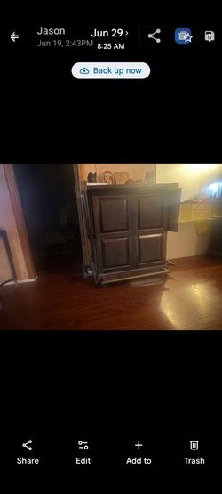 Home furniture Ethan Allen Barr with wheels 1970s , fold up . Approximately 72 in Long with a dark varnish    .