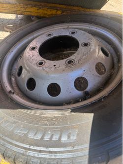 2 rims and tire