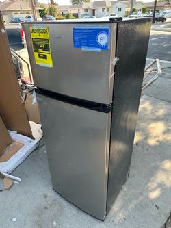 Brand new refrigerator, and freezer apartment style