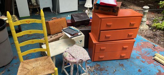 Old Suitcases And Chairs