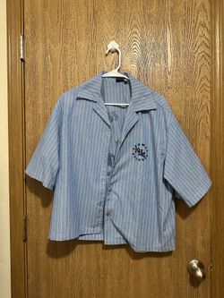 Light blue button up