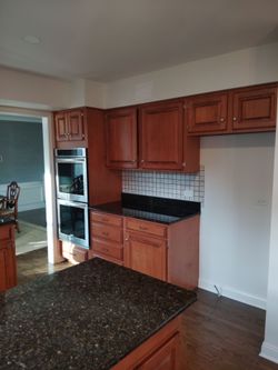 Kitchen cabinets with granite countertop cooked up faucet sink garbage disposal